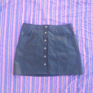 Black faux leather mini skirt